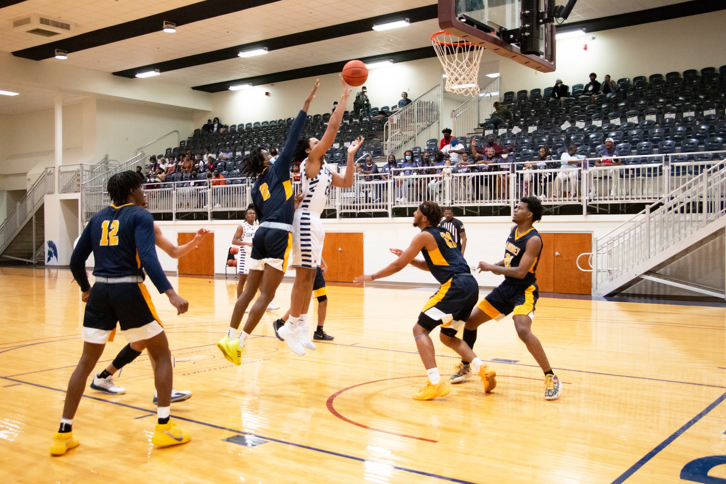 Mark Vance, Jr. scoring about defenders in the paint